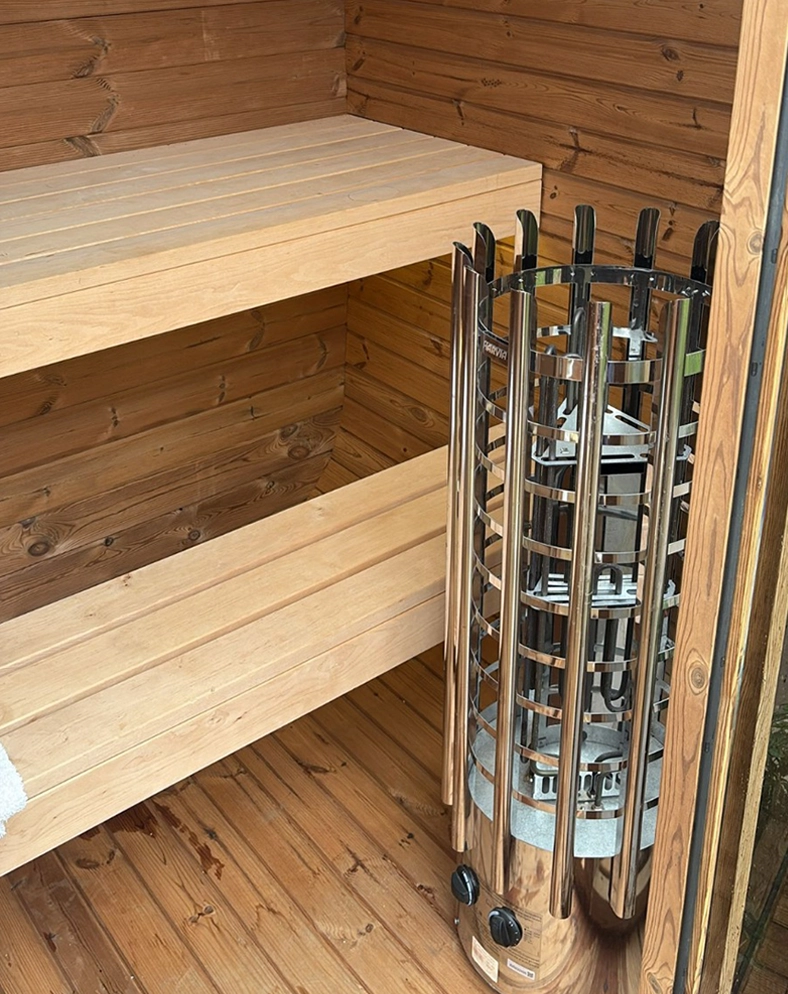 Modern thermowood cube sauna in garden Aberdeen Scotland