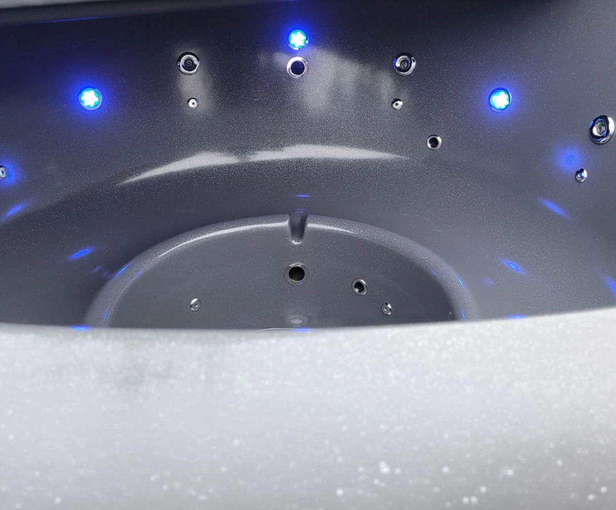 Luxury garden hot tub by GreenArt Landscapers in Aberdeen